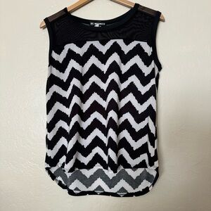 Hot Ginger sleeveless women’s black and white stripped top Size L
